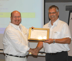 Dr. Tim (left) receiving recognition from the Society of Manufacturing Engineers, Toronto Chapter 26. Dr. Juergen Boenisch (right) is Chair. 2008.